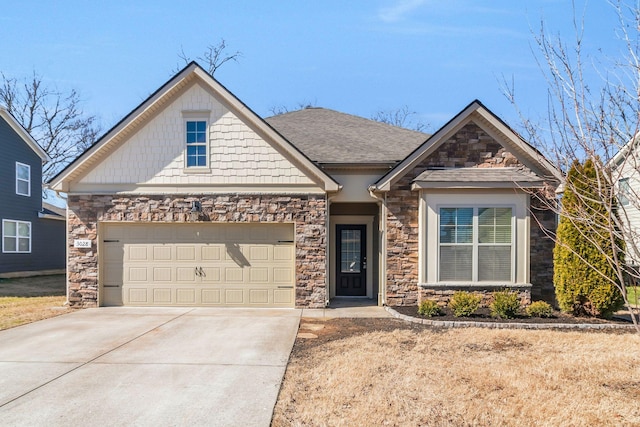 view of front of property featuring stone siding, roof with shingles, driveway, and an attached garage