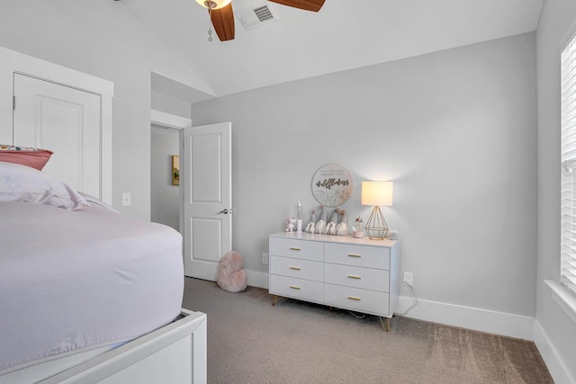 bedroom with light colored carpet, visible vents, and baseboards