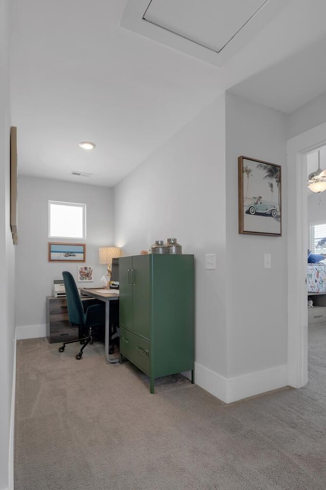 office with carpet, visible vents, and baseboards