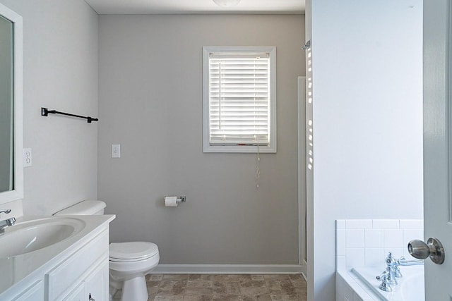 full bathroom featuring baseboards, a shower, toilet, a garden tub, and vanity