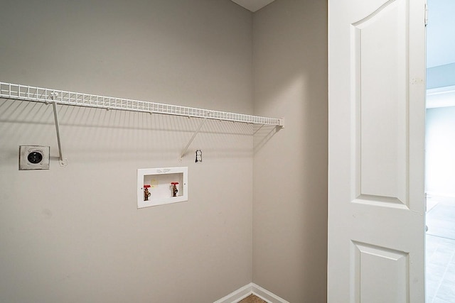 clothes washing area with hookup for a washing machine, laundry area, hookup for an electric dryer, and baseboards