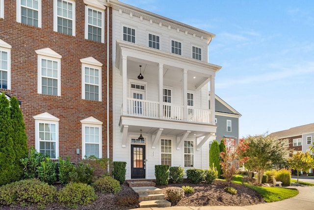 view of front of house with brick siding