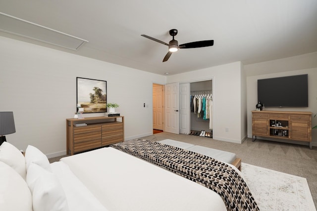 bedroom featuring a ceiling fan, carpet, baseboards, and a closet