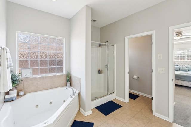 806 Warrington Ct, Gallatin, TN 37066 - ensuite bathroom with baseboards, a stall shower, a whirlpool tub, tile patterned flooring, and ensuite bathroom