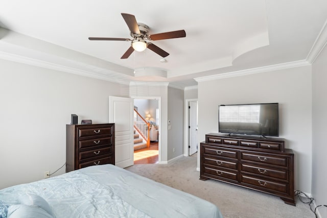 806 Warrington Ct, Gallatin, TN 37066 - bedroom featuring a tray ceiling, crown molding, baseboards, and light carpet