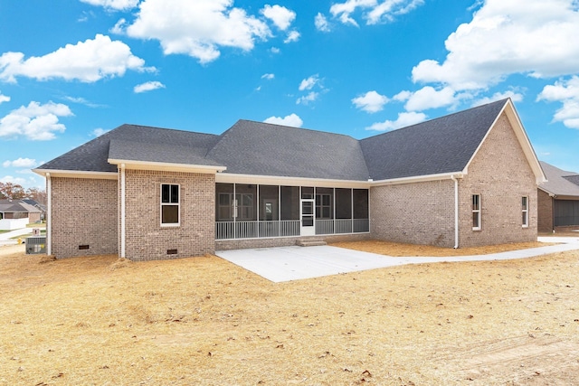 back of house with a patio, brick siding, a sunroom, crawl space, and roof with shingles