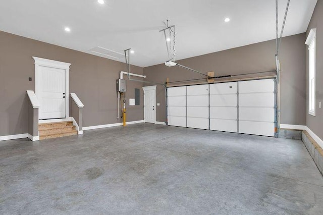 garage featuring a garage door opener, recessed lighting, electric panel, and baseboards