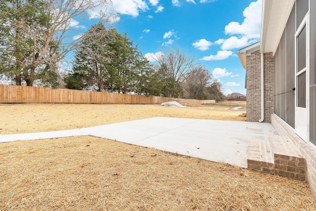 view of yard with a patio and a fenced backyard