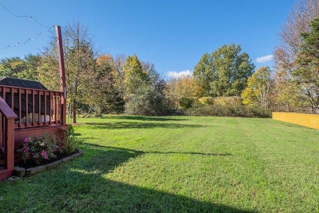 view of yard with a deck