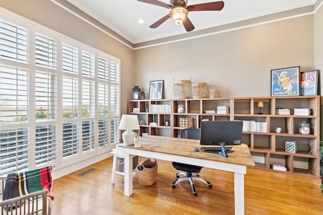 office featuring crown molding, recessed lighting, visible vents, ceiling fan, and wood finished floors