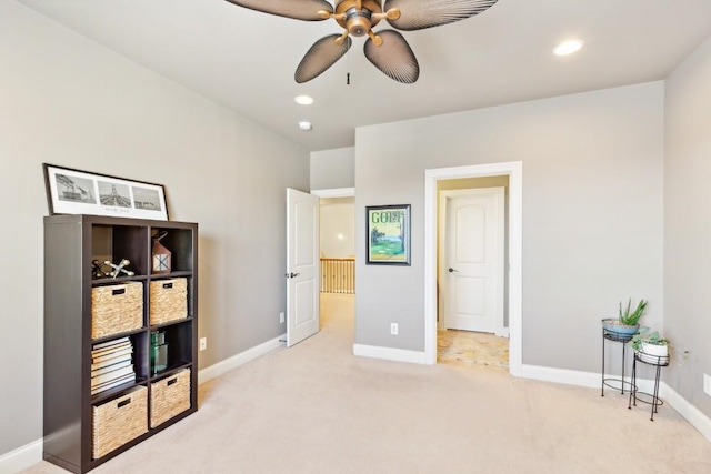 bedroom featuring recessed lighting, light carpet, and baseboards