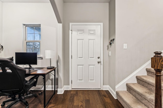 office space featuring dark wood-type flooring and baseboards