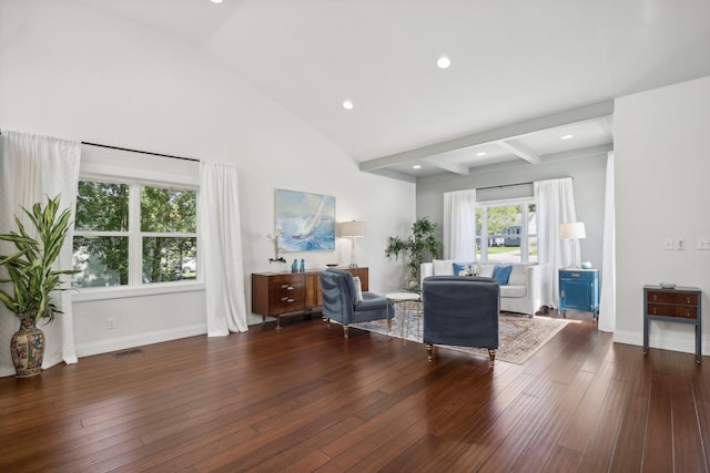 living area with high vaulted ceiling, hardwood / wood-style floors, beamed ceiling, and visible vents