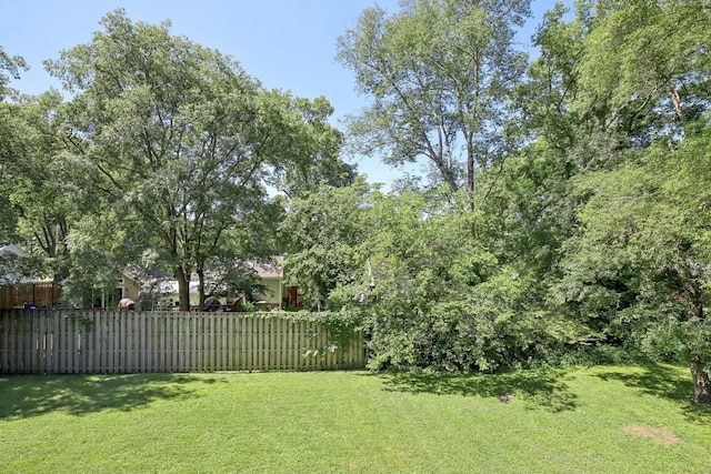 view of yard with fence