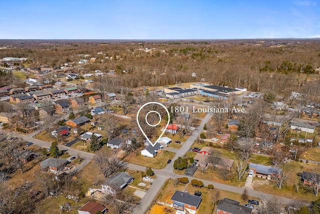 birds eye view of property with a residential view