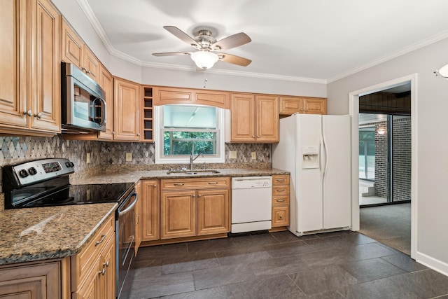 kitchen featuring stone counters, a sink, ornamental molding, appliances with stainless steel finishes, and tasteful backsplash