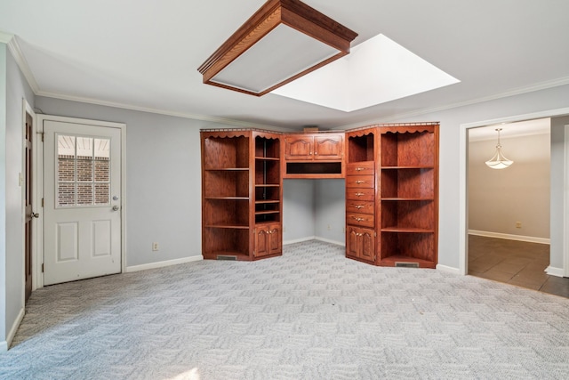 interior space featuring light carpet, crown molding, visible vents, and baseboards