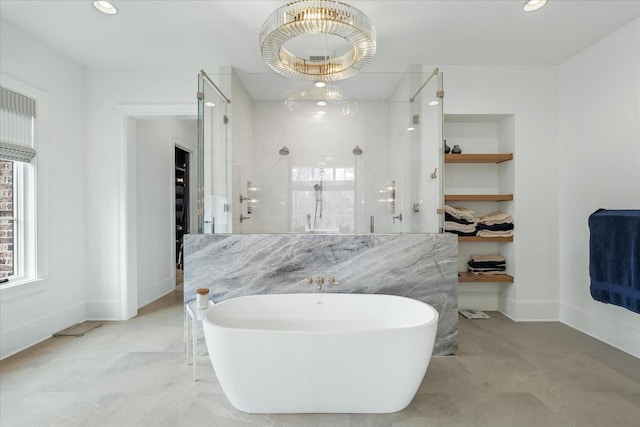 full bath featuring a stall shower, recessed lighting, built in features, and a soaking tub