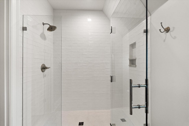 bathroom with a stall shower