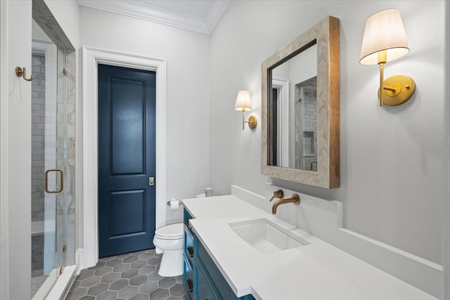 full bathroom featuring toilet, ornamental molding, a stall shower, vanity, and tile patterned floors