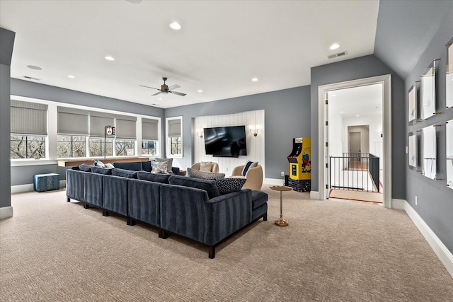 carpeted living room featuring recessed lighting, visible vents, and baseboards