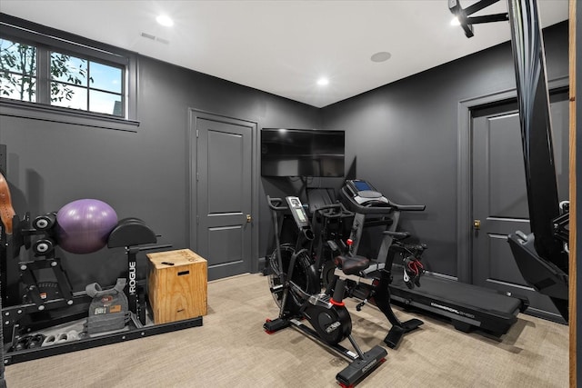 workout area featuring carpet floors, visible vents, and recessed lighting