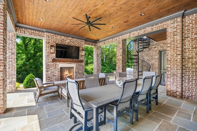 9289 Fordham Dr, Brentwood, TN 37027 - view of patio / terrace featuring an outdoor brick fireplace, stairs, ceiling fan, and outdoor dining space