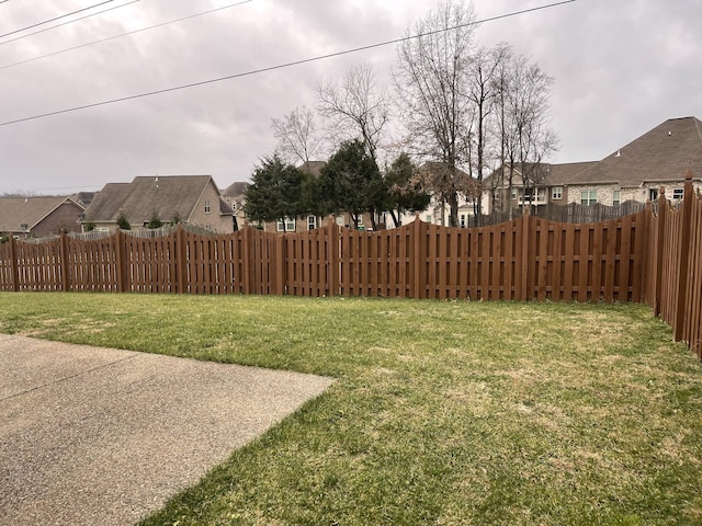 view of yard with fence