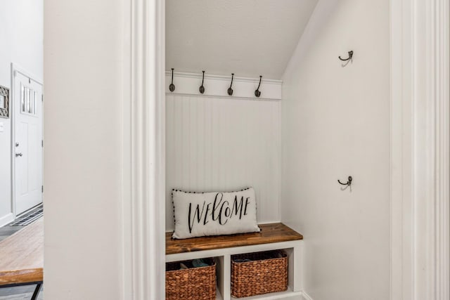 mudroom featuring a textured ceiling