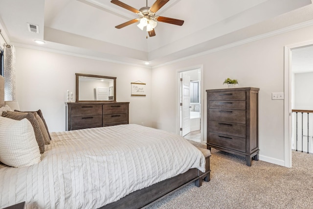 bedroom with carpet, visible vents, a raised ceiling, and crown molding