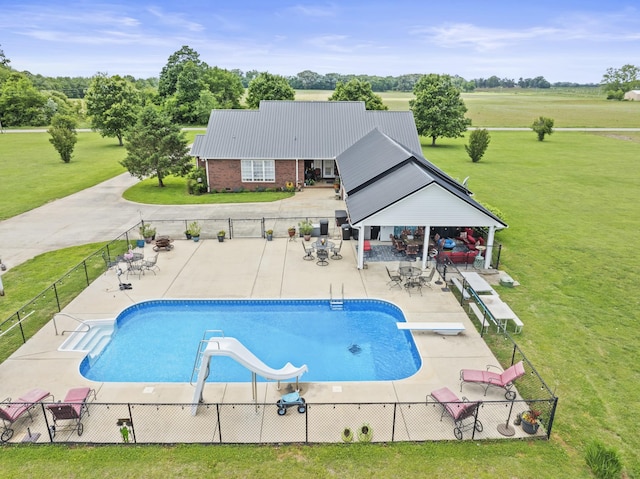 181 Hickory Grove Rd, Huntland, TN 37345 - view of pool featuring a patio area, a diving board, a gazebo, and a water slide