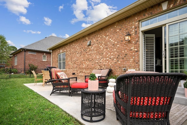 view of patio with fence and an outdoor living space