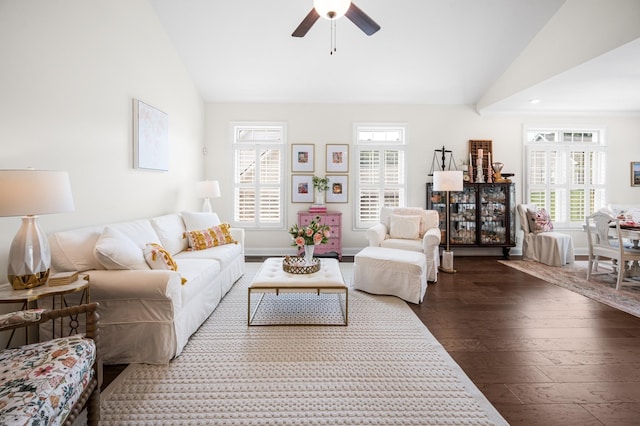 living area featuring baseboards, ceiling fan, dark wood-style flooring, vaulted ceiling, and recessed lighting