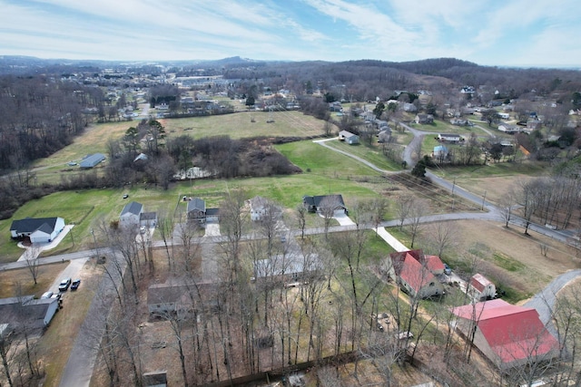 birds eye view of property featuring a rural view