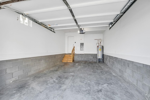 garage with a garage door opener, electric panel, and water heater