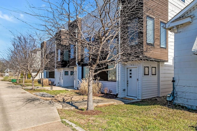 view of side of home with an outbuilding