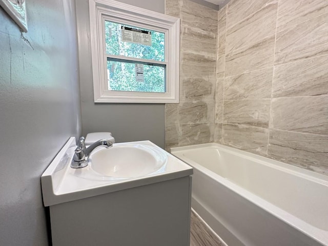 full bathroom with vanity