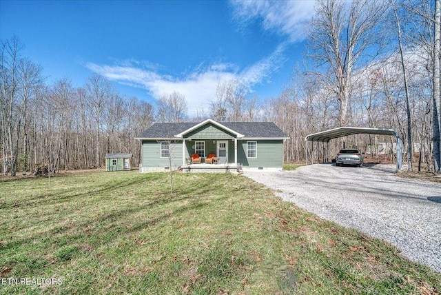 view of front of home featuring a porch, crawl space, a carport, driveway, and a front lawn