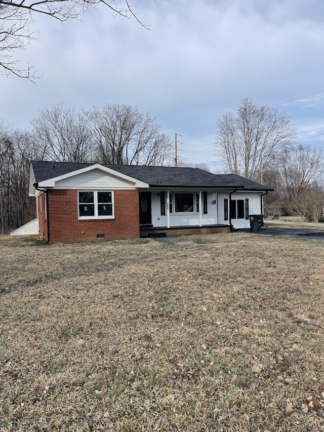 ranch-style house featuring a porch, brick siding, crawl space, and a front yard