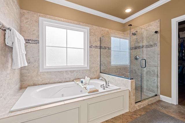 full bath featuring ornamental molding, a stall shower, plenty of natural light, and a jetted tub