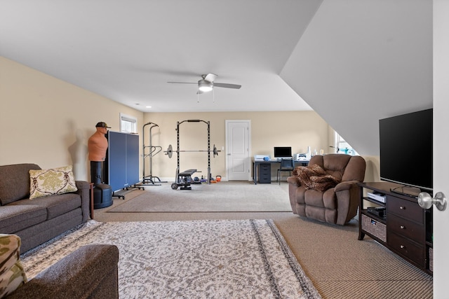 carpeted living room featuring ceiling fan and a healthy amount of sunlight