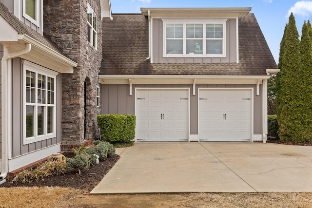 garage featuring driveway