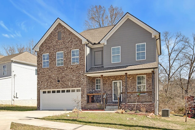 traditional-style house with covered porch, brick siding, and concrete driveway