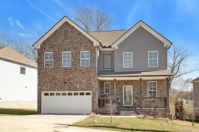 traditional-style house featuring a porch, a garage, brick siding, driveway, and a front lawn