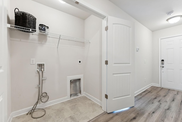 laundry room featuring light wood finished floors, hookup for a washing machine, hookup for an electric dryer, laundry area, and baseboards