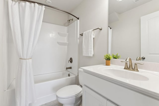 full bath featuring shower / bathtub combination with curtain, toilet, and vanity