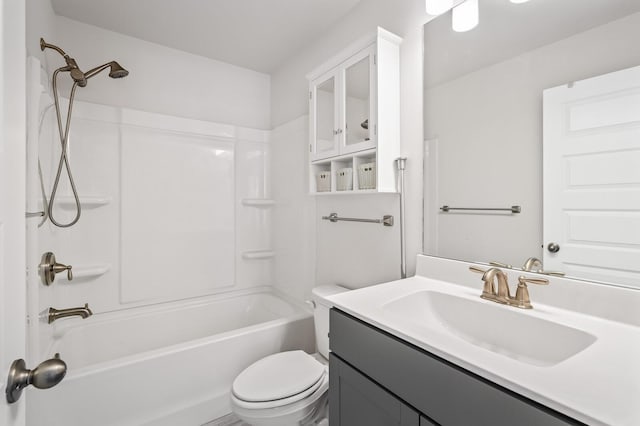 full bath featuring bathtub / shower combination, vanity, and toilet