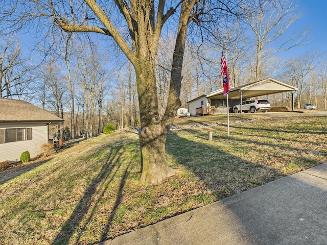 view of yard with a carport