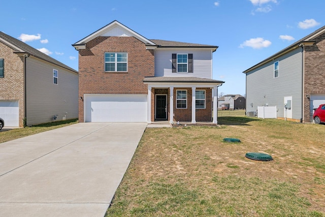 traditional-style house with a garage, concrete driveway, and brick siding