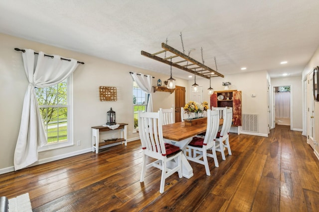 dining space featuring recessed lighting, wood-type flooring, visible vents, and baseboards